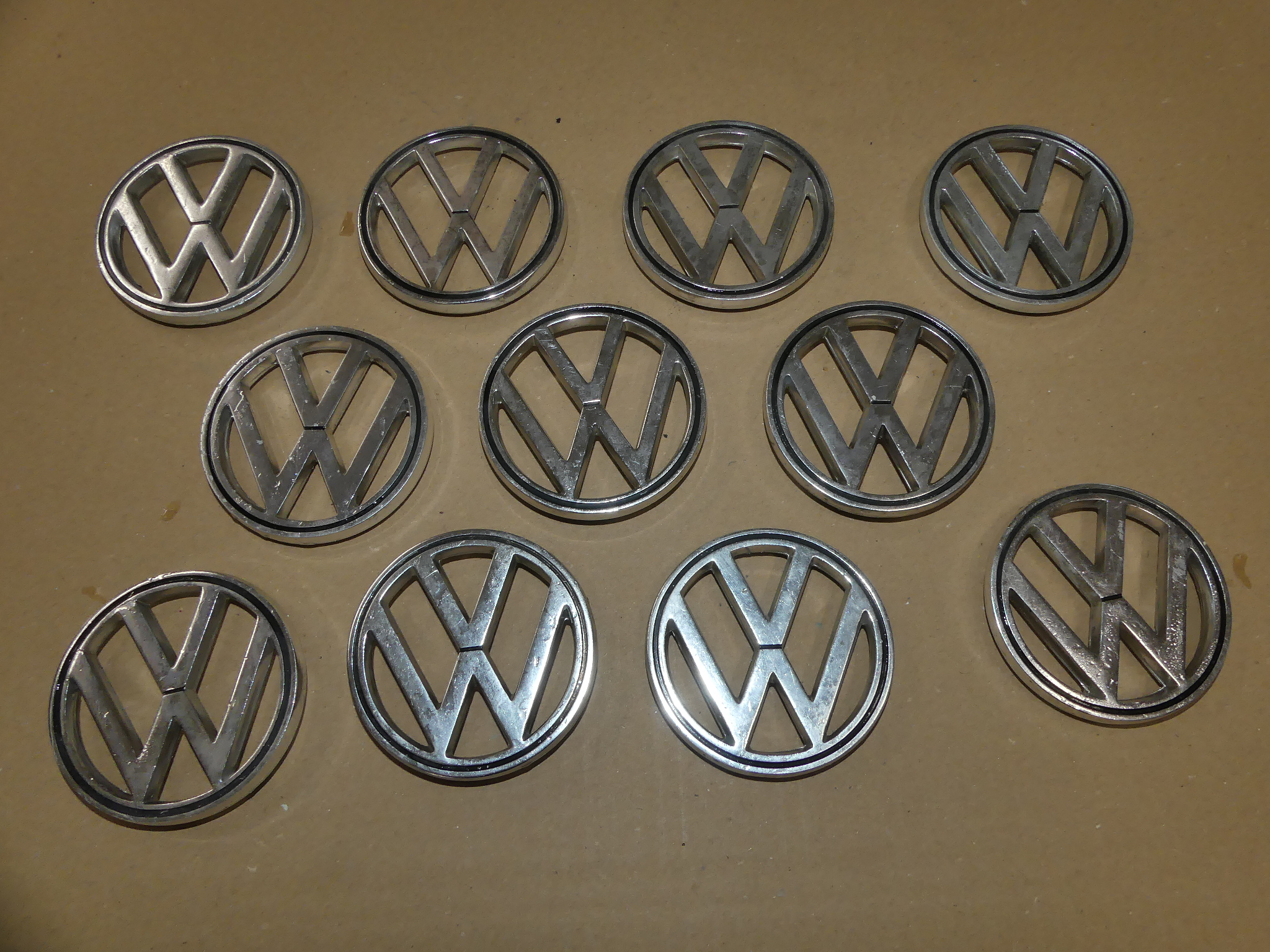 Emblem, 11.62-4.79-Gebrauchtteil Emblem, 11.62-4.79-Gebrauchtteil