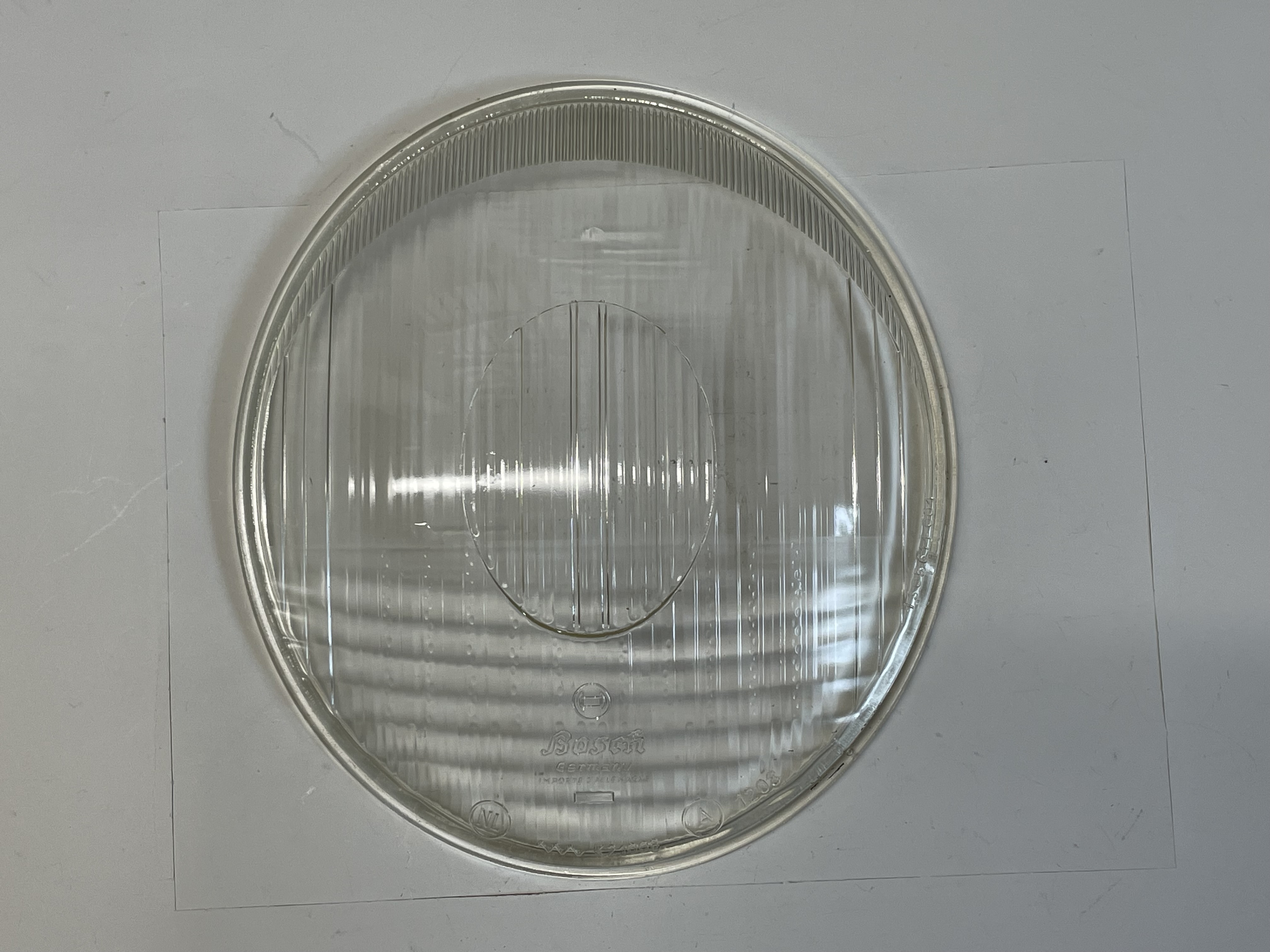 Scheinwerferglas, "liegend", BOSCH, symmetrisch ohne VW-Zeichen (Gebrauchtteil)